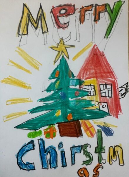 Colourful children's drawing of a Christmas tree with the words Merry Chirstmas (mis-spelled)