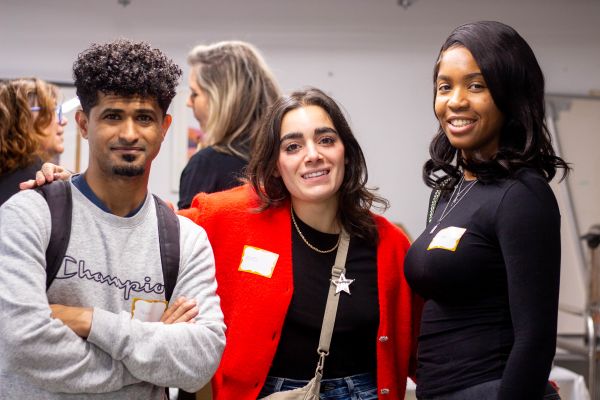 Two young women and one young man