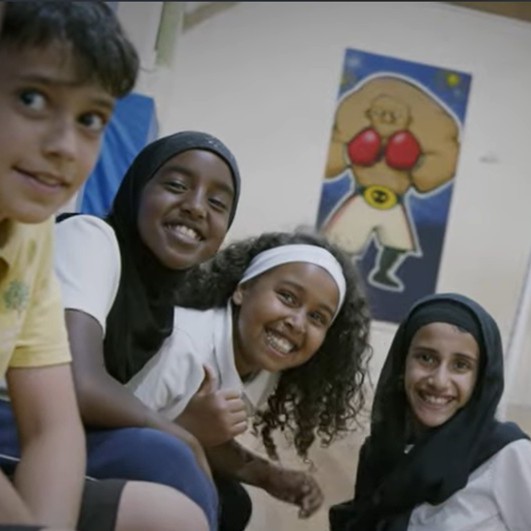A group of smiling children at the Sulgrave club